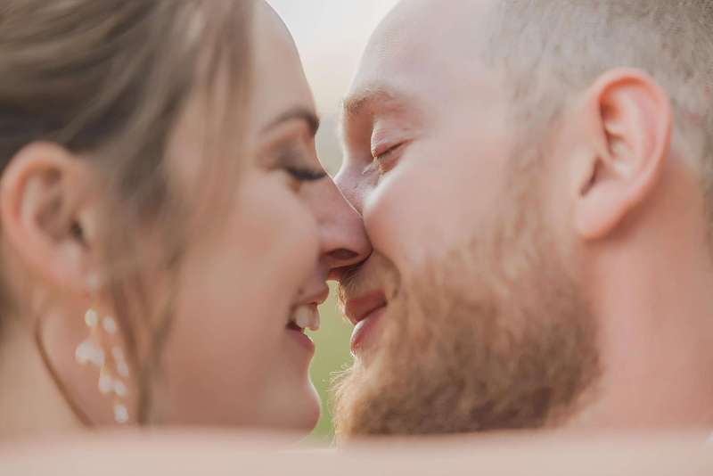a close up shot of a bride and groom kissing in Colorado